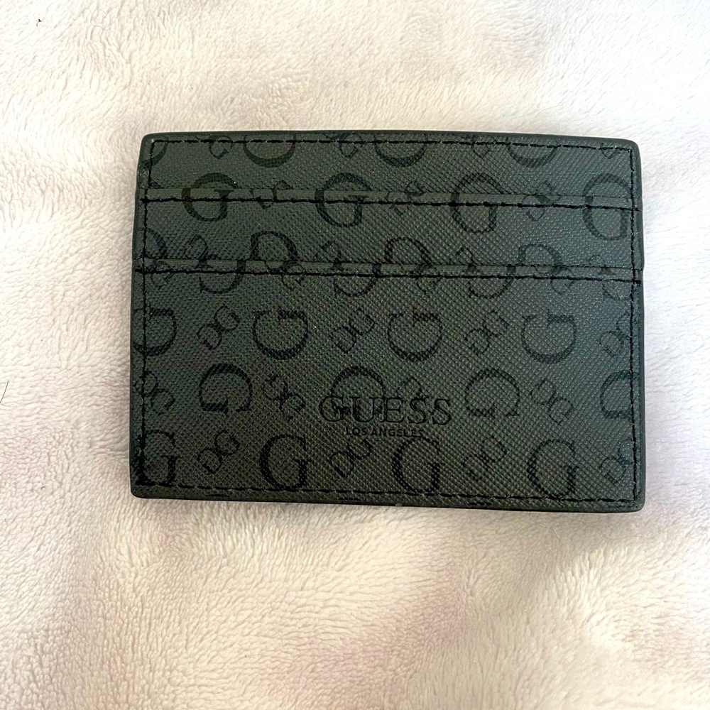 “Guess” 2 card slots and front ID slot